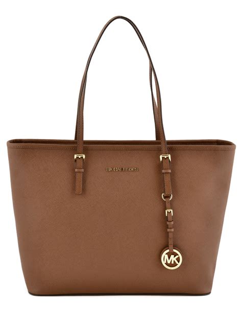 avg cost to make a michael kors purse|Michael Kors purses prices.